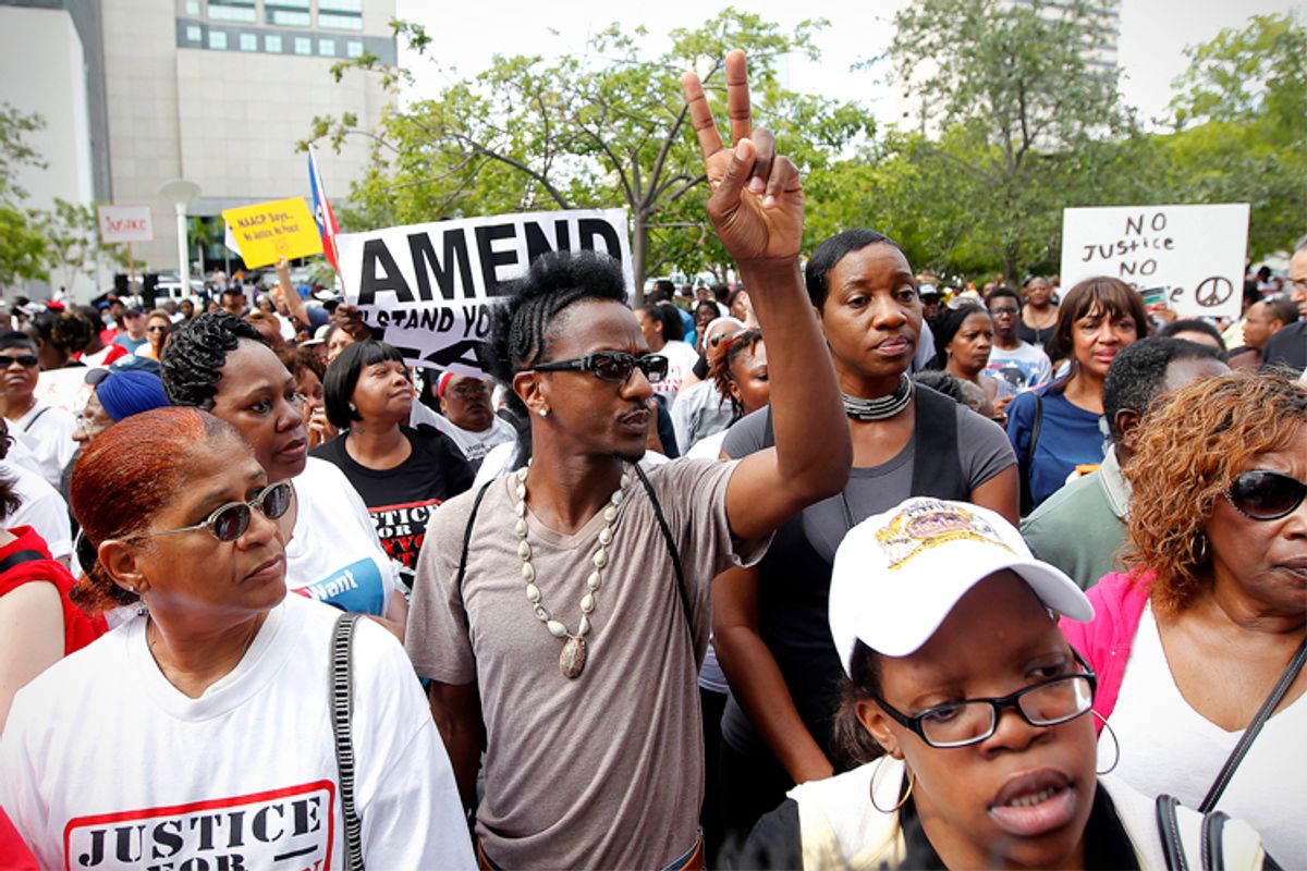 Protestors at a rally for Tracy Martin in Miami, Florida    (Reuters/Andrew Innerarity)