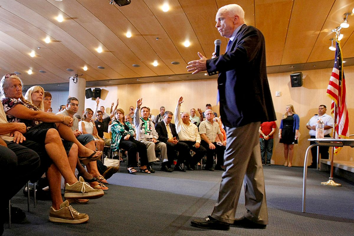 John McCain speaks with constituents during a town hall meeting in Phoenix, Sept. 5, 2013.            (AP/Ralph Freso)