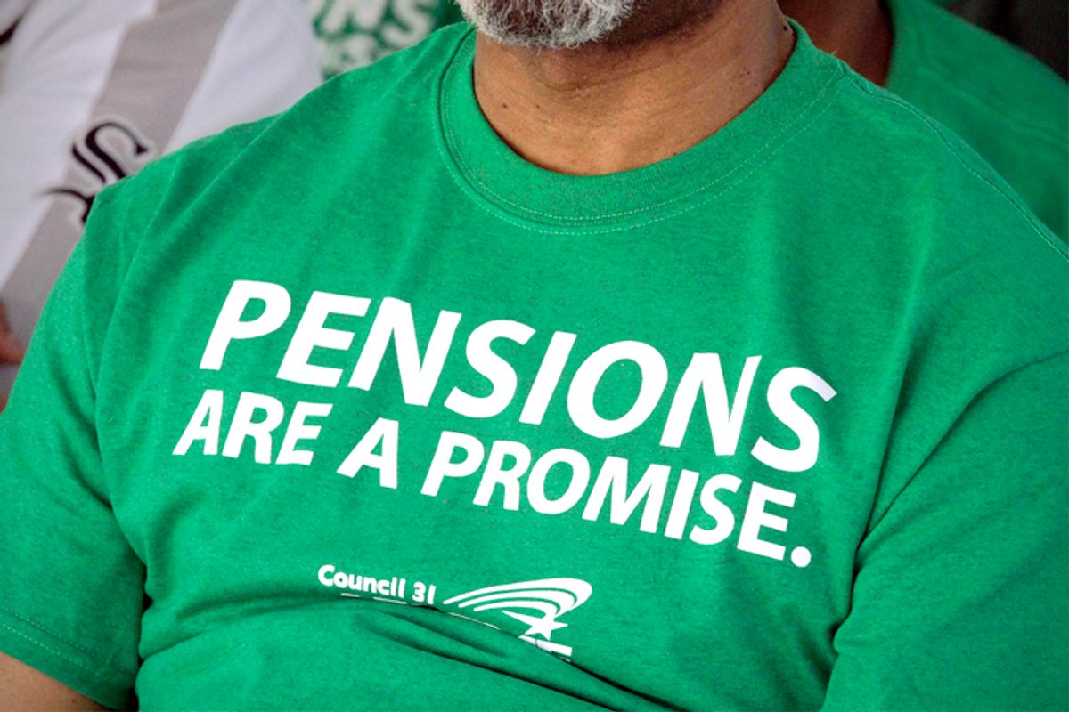 American Federation of State County and Municipal Employees union member wears their protest message on his shirt while rallying against the proposed pension legislation in Springfield, Ill.    (AP/Seth Perlman)
