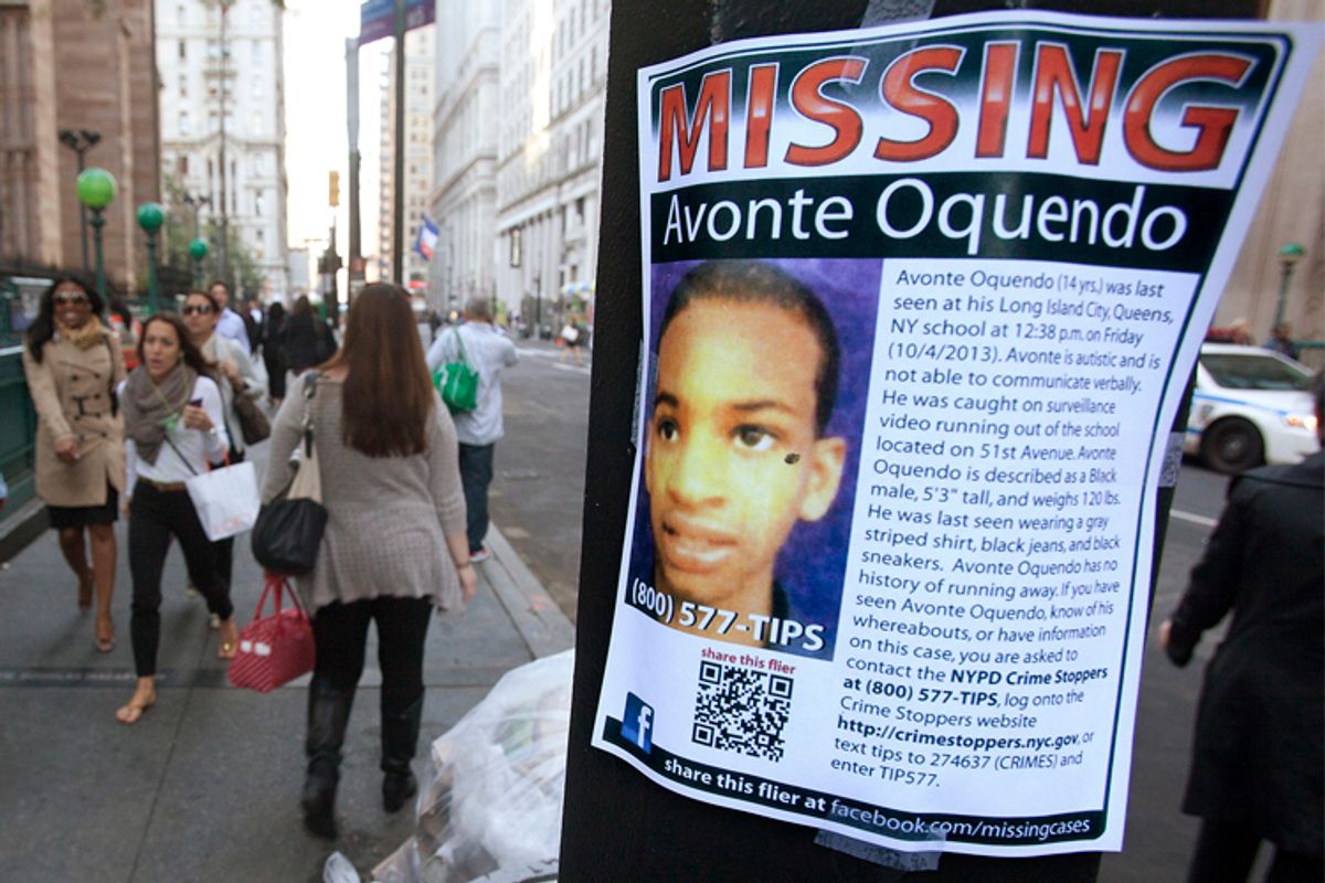 A poster for Avonte Oquendo is seen in downtown New York October 15, 2013.     (Reuters/Carlo Allegri)