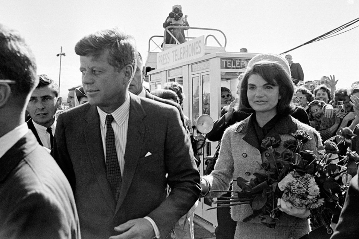 President John F. Kennedy and Jacqueline Kennedy arrive at Dallas Airport, Nov. 22, 1963.      (AP)