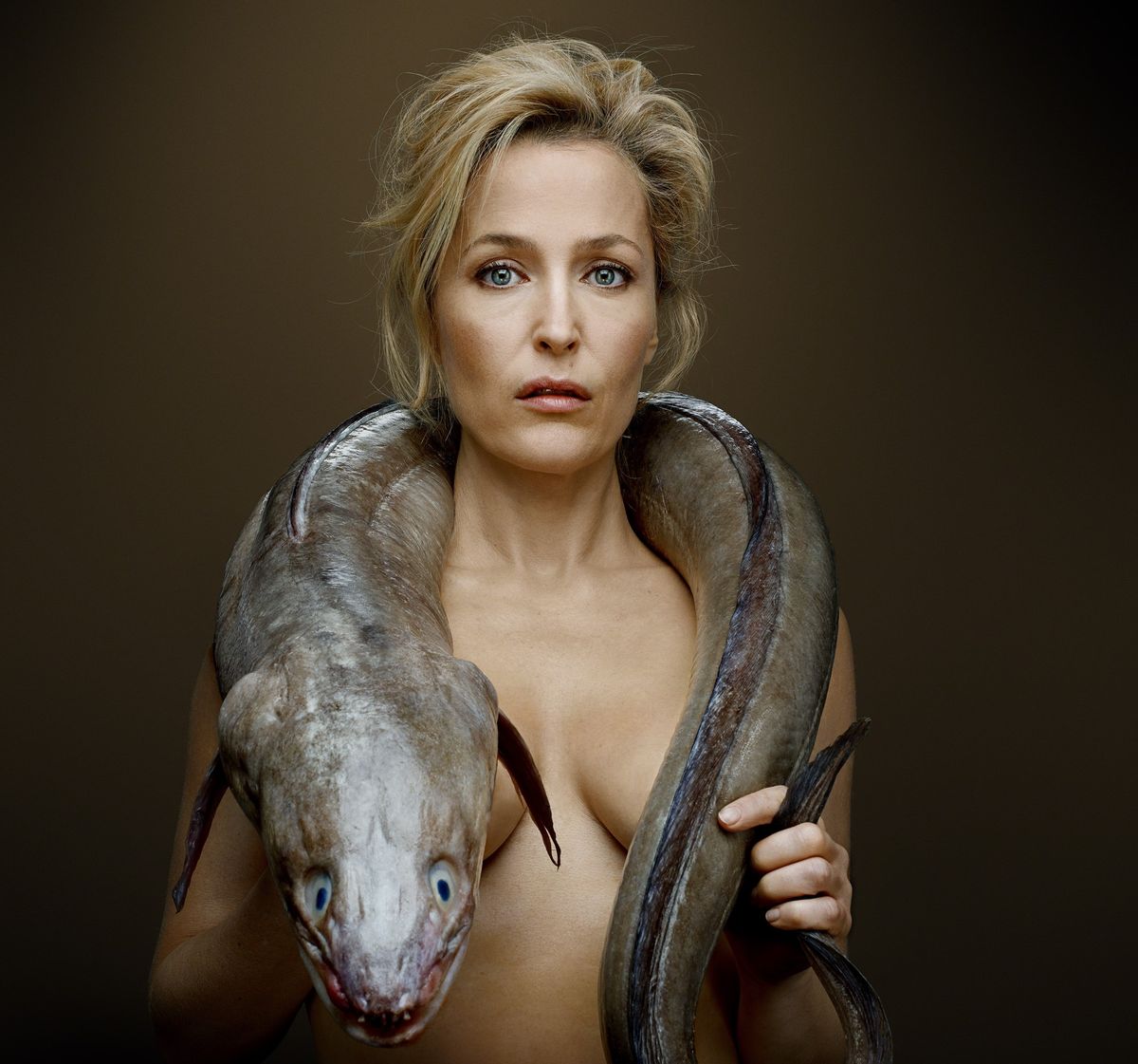 Gillian Anderson poses topless with a conger eel   (Denis Rouvre/Fishlove)