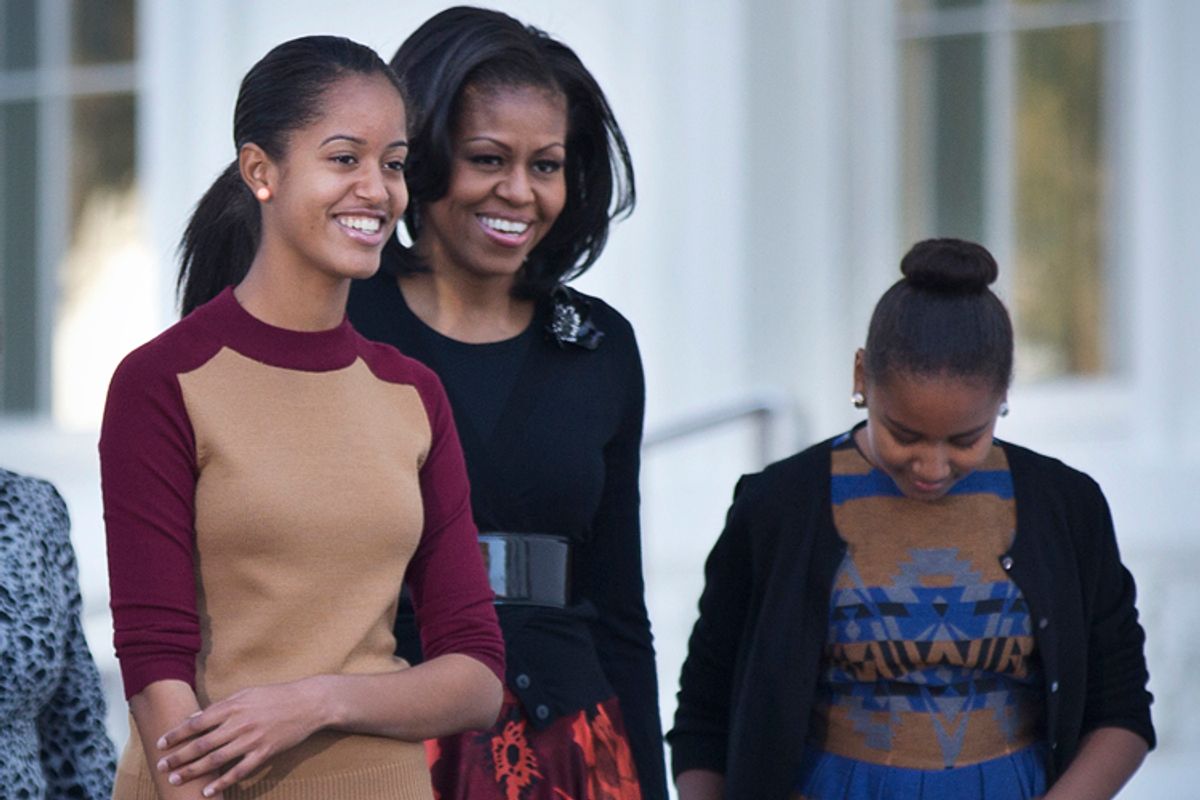 Michelle Obama, with daughters Sasha and Malia.             (AP/Manuel Balce Ceneta)
