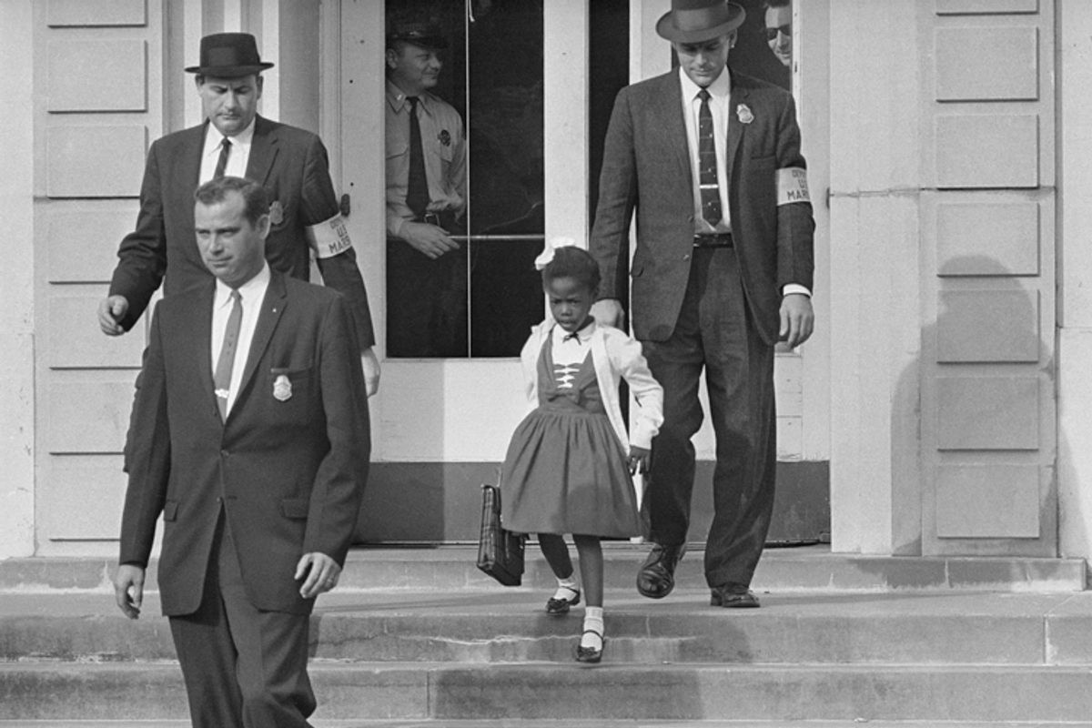 U.S. Deputy Marshals escort 6-year-old Ruby Bridges from William Frantz Elementary School in New Orleans, November 1960.     (AP)