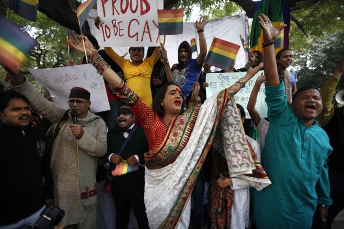 Gay rights activists protest after the country's top court ruled that a colonial-era law criminalizing homosexuality will remain in effect in India.  (Credit: Altaf Qadri/AP)