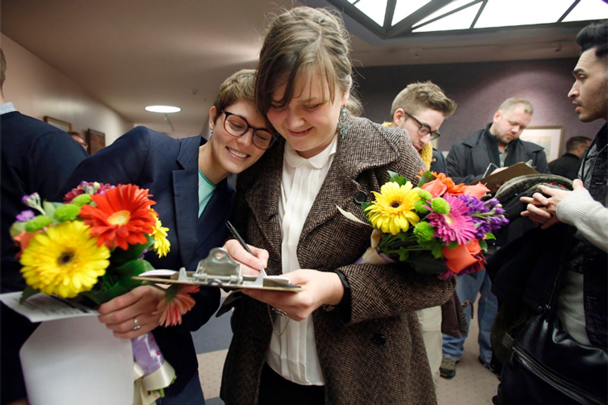 The author, left, with Nicole Christensen as they wait to get married at the Salt Lake County Clerk's office on Dec. 20, 2013.                    (Reuters/Jim Urquhart)