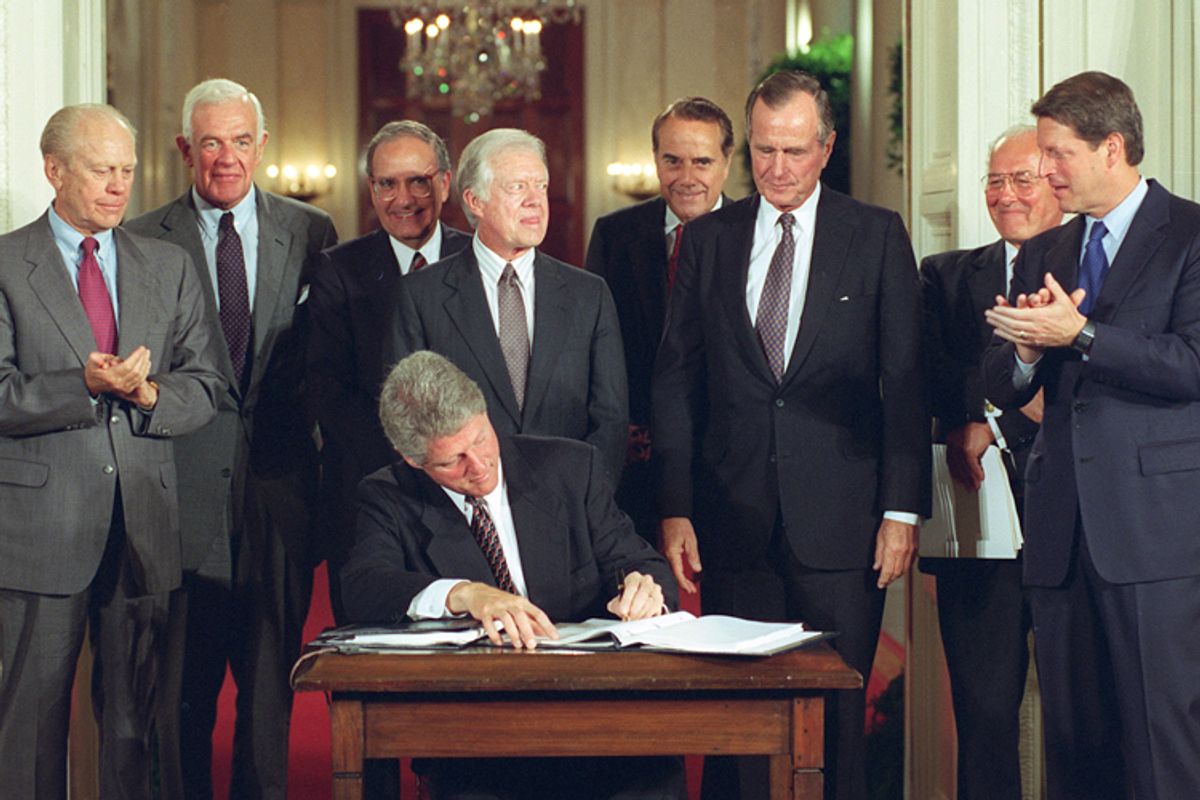 Bill Clinton signs side deal of the three-nation North American Free Trade Agreement (NAFTA) at the White House, Washington, D.C., Sept. 14, 1993.       (AP/Ron Edmonds)