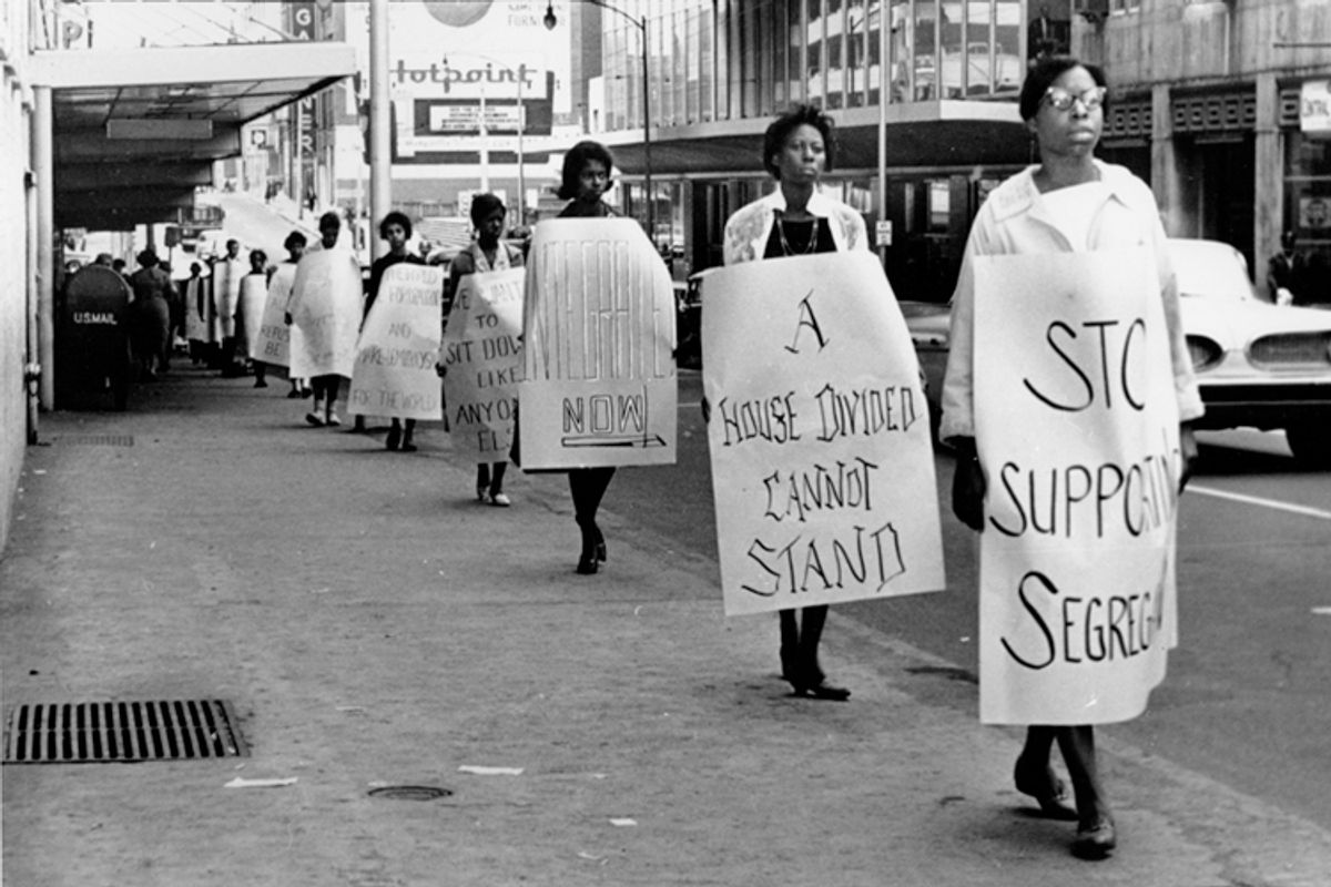 Picketers outside Rich's department store protesting against segregated eating facilities at one of its lunch counters in Atlanta, Ga., on Oct. 19, 1960.    (AP)