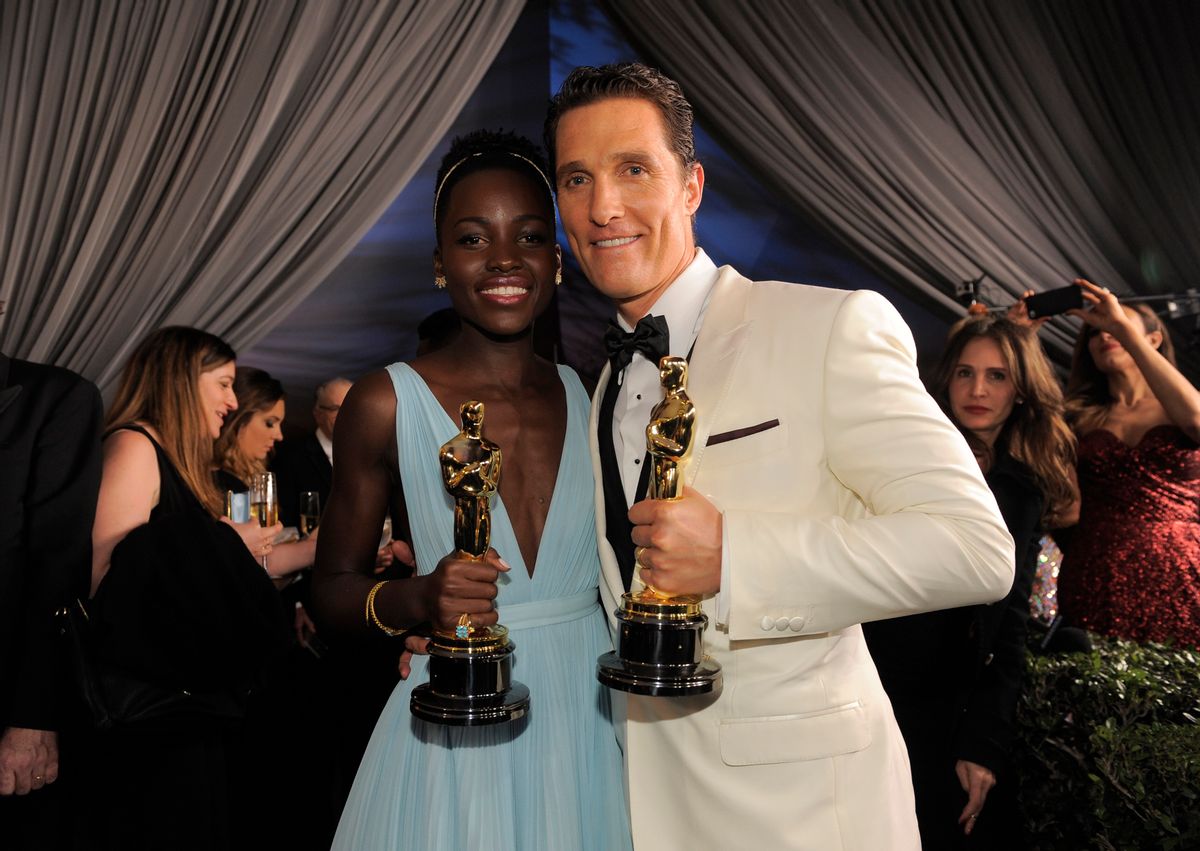 Lupita Nyong'o, winner of the award for best actress in a supporting role for "12 Years a Slave" and Matthew McConaughey winner of the award for best actor for his role in the "Dallas Buyers Club" attend the Governors Ball after the Oscars on Sunday, March 2, 2014, at the Dolby Theatre in Los Angeles.  (Photo by Chris Pizzello/Invision/AP)    (Chris Pizzello/invision/ap)
