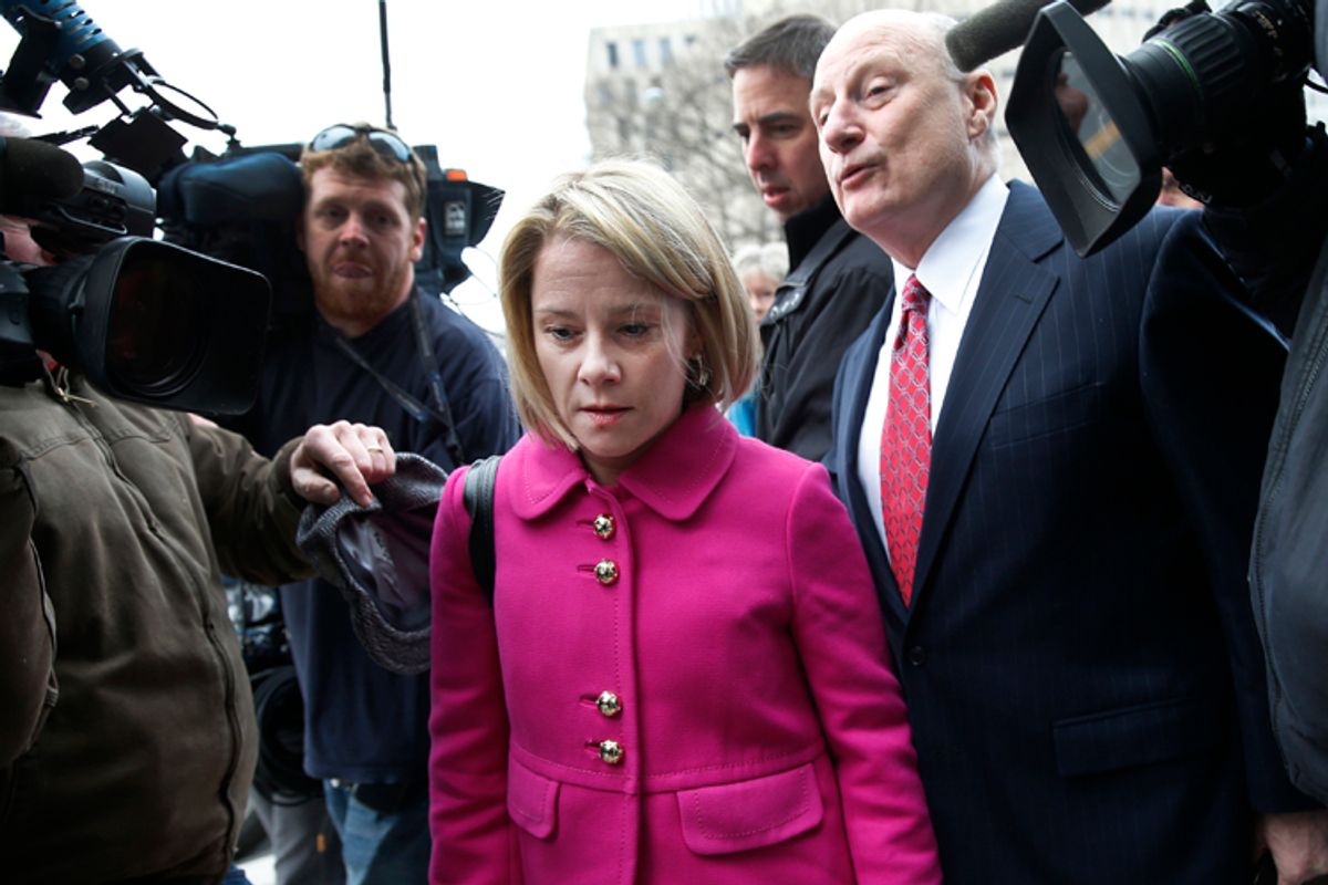 Bridget Anne Kelly makes her way through a crush of media with her attorney as she arrives at Mercer County Court in Trenton, New Jersey, March 11, 2014.    (Reuters/Mike Segar)