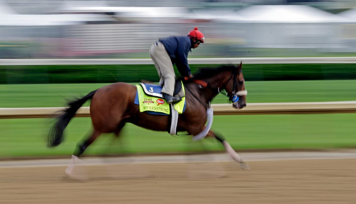 Kentucky Derby hopeful Wicked Strong gets a morning workout at Churchill Downs.  (AP/Morry Gash)