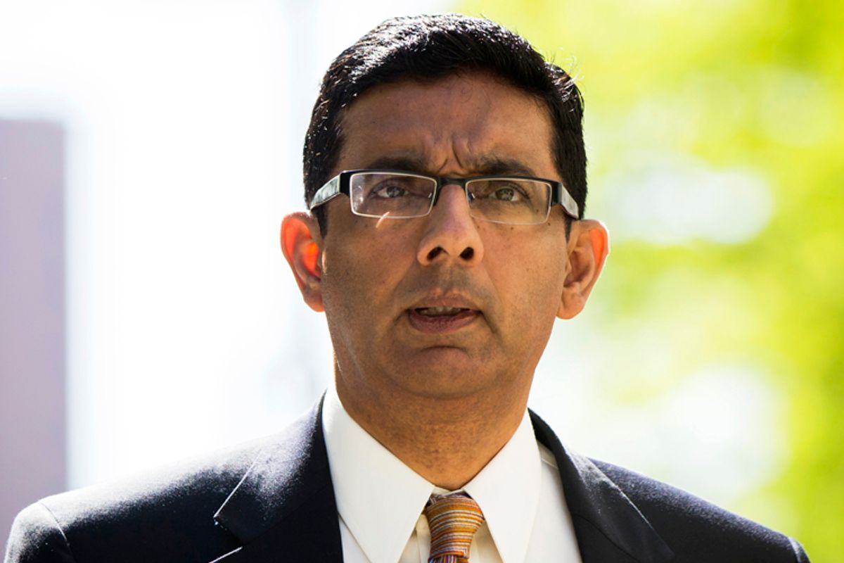 Dinesh D'Souza exits the Manhattan Federal Courthouse after pleading guilty in New York, May 20, 2014.                   (Reuters/Lucas Jackson)