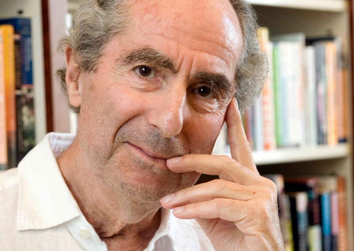 FILE - In this Sept. 8, 2008 file photo, author Philip Roth poses for a photo in the offices of his publisher Houghton Mifflin, in New York.  (AP Photo/Richard Drew, file)
