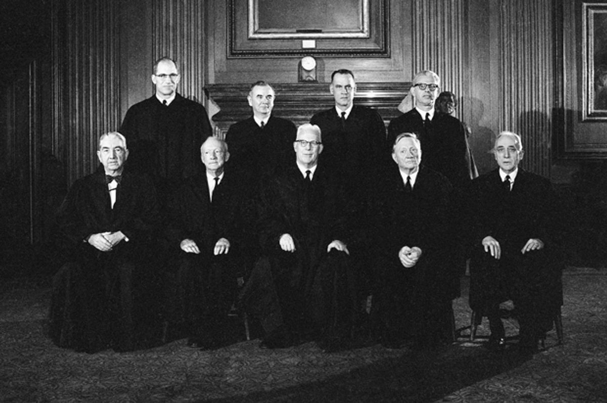 Chief Justice Earl Warren and the eight associate justices of the Supreme Court, Nov. 19, 1962.          (AP)