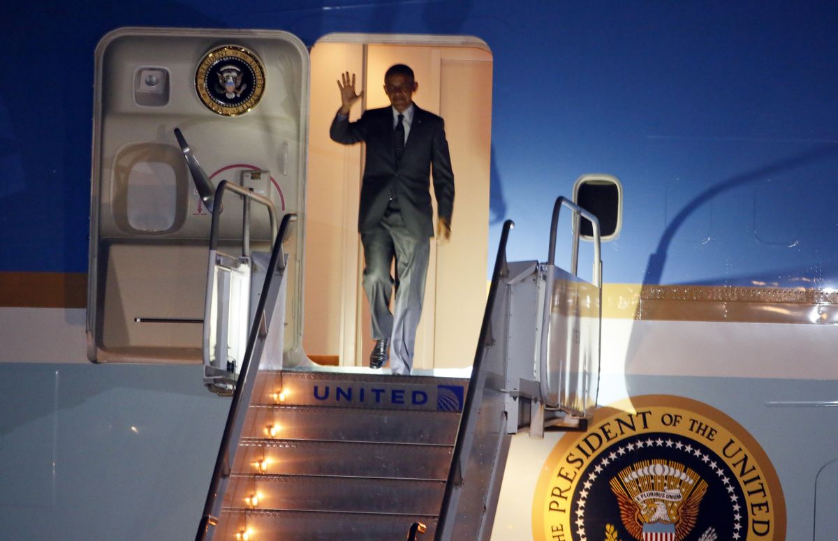 President Barack Obama waves as he exits Air Force One on arrival to Austin-Bergstrom International Airport on Wednesday, July 9, 2014, in Austin, Texas. Obama is spending the night in the Texas capital and on Thursday he will make a speech on the economy. (AP Photo/Jack Plunkett)  (AP)