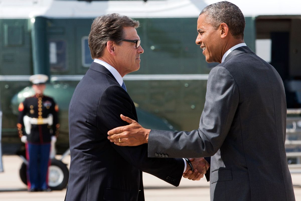 President Barack Obama, right, and Texas Gov. Rick Perry shake hands as Obama arrives in Dallas where they will attend a meeting about the border and immigration together, Wednesday, July 9, 2014. (AP Photo/Jacquelyn Martin) (AP)