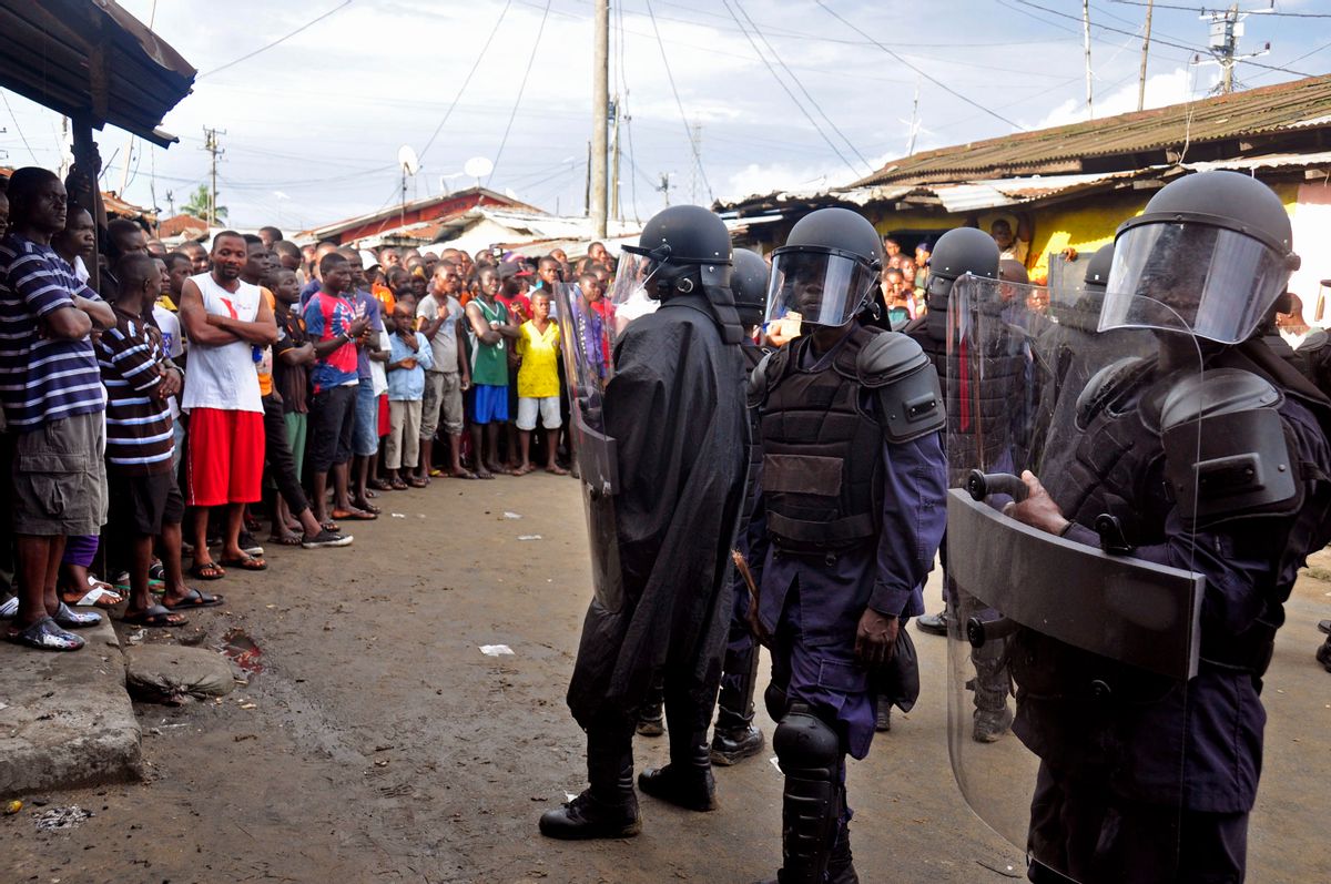 Liberian security officers in Monrovia  (AP/Abbas Dulleh)
