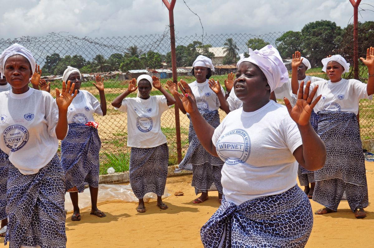 Women from different religious groups prey against the spread of the Ebola virus, in Monrovia, Liberia, Saturday Aug. 2, 2014. An Ebola outbreak that has killed more than 700 people in West Africa is moving faster than efforts to control the disease, the head of the World Health Organization warned as presidents from the affected countries met Friday in Guinea's capital. (AP Photo/Abbas Dulleh) (AP)