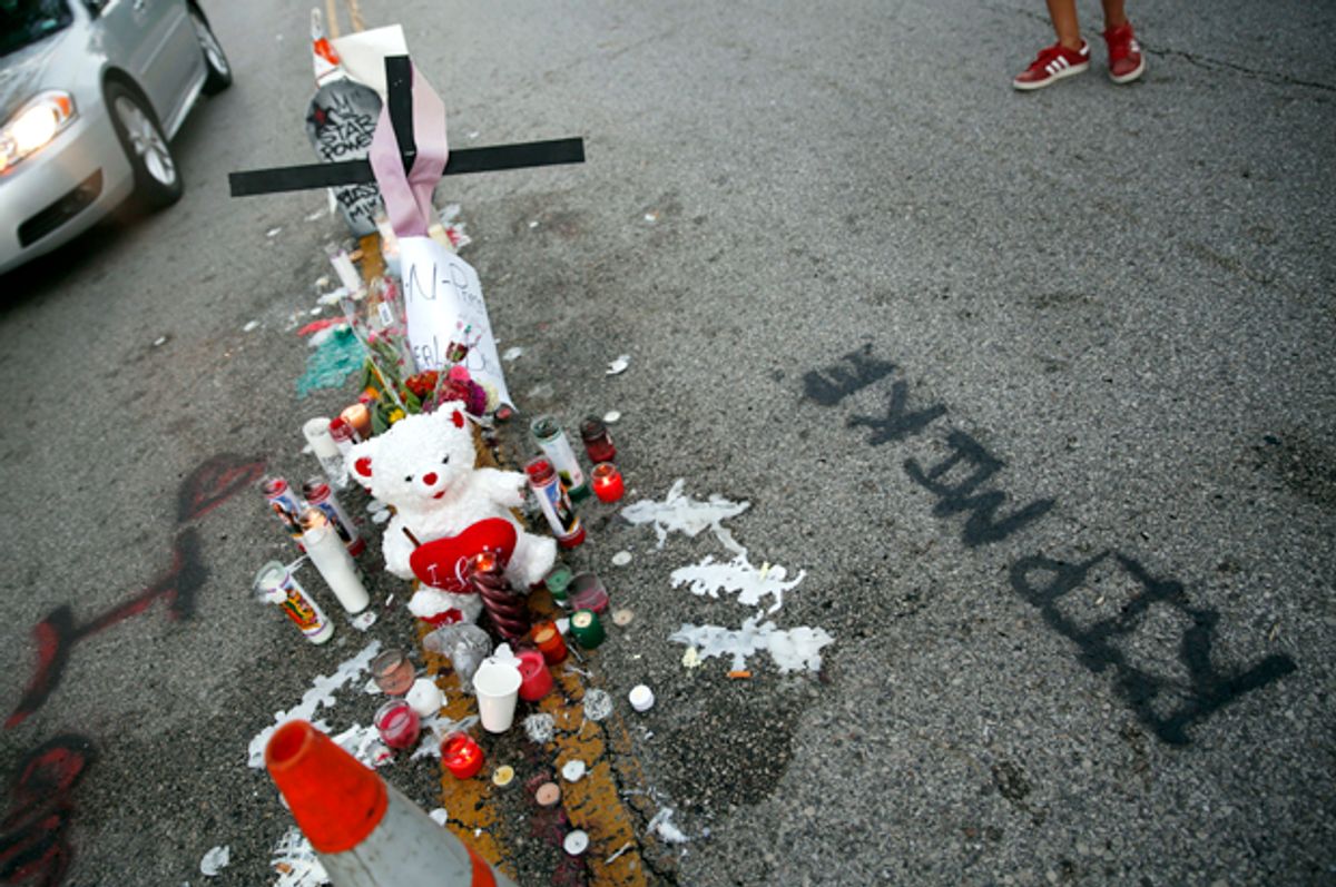 A makeshift memorial for Michael Brown, Aug. 11, 2014, in Ferguson, Mo.       (AP/Jeff Roberson)