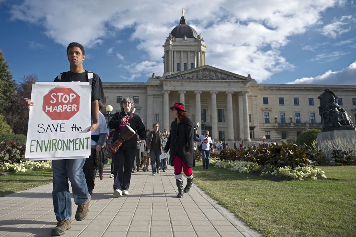 Daemon Bath leads a march departing the Manitoba Legislative Building marking the first anniversary of Occupy Wall Street on September 17, 2012 in Winnipeg.   (Nic Neufeld/Shutterstock)