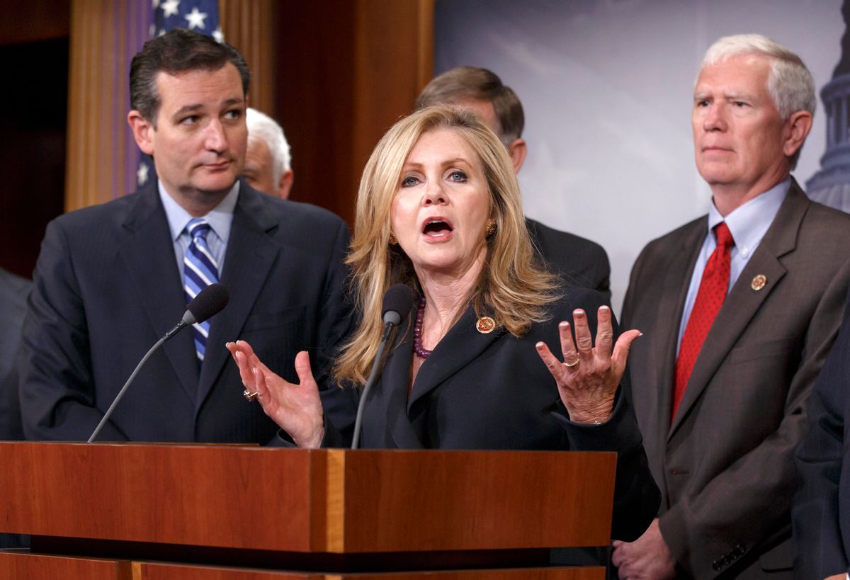 Rep. Marsha Blackburn, R-Tenn., center, flanked by Sen. Ted Cruz, R-Texas, left, and Rep. Mo Brooks, R-Ala., right, joins in criticizing President Barack Obama on immigration, Tuesday, Sept. 9, 2014, during a Republican news conference about the immigration crisis along the U.S.-Mexico border, Capitol Hill in Washington.  (AP Photo/J. Scott Applewhite)  (AP)