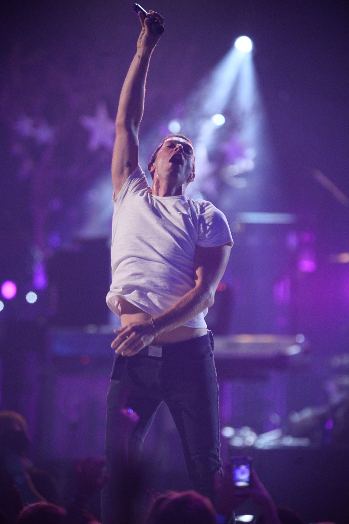 Chris Martin of Coldplay performs at the iHeartRadio Music Festival at the MGM Grand Garden Arena on Sept. 19, 2014 in Las Vegas, Nevada. (Photo by Al Powers/Powers Imagery/Invision/AP) (Powers Imagery/invision/ap)