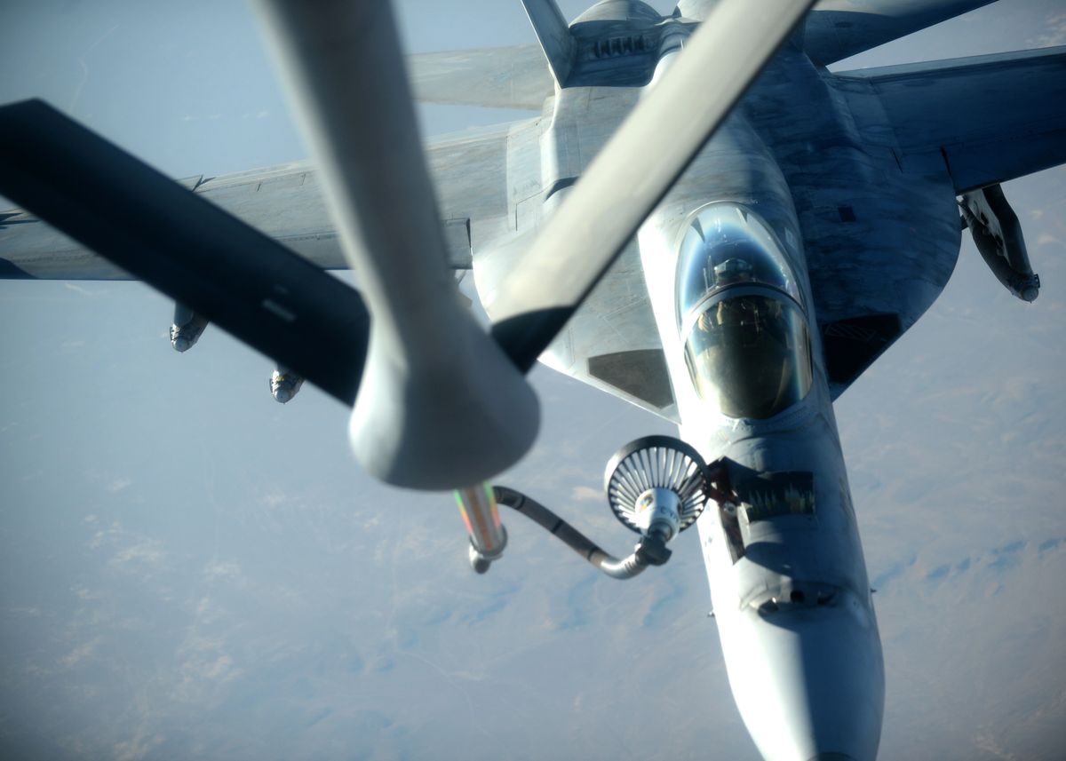 FILE -- In this Tuesday, Sept. 23, 2014 file photo released by the U.S. Air Force, a U.S. Navy F-18E Super Hornet fighter jet receives fuel from a KC-135 Stratotanker over northern Iraq. A refueling accident involving a similar model of jet, the F/A-18D, resulted in the tragic death of six U.S. Marines. (AP Photo/U.S. Air Force, Shawn Nickel, File) (AP)