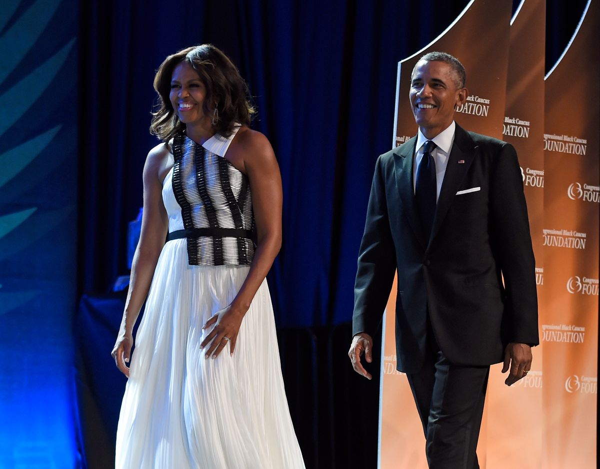 President Barack Obama and first lady Michelle Obama arrive at the Congressional Black Caucus Foundations 44th Annual Legislative Conference Phoenix Awards Dinner in Washington, Saturday, Sept. 27, 2014. (AP Photo/Susan Walsh)  (AP)