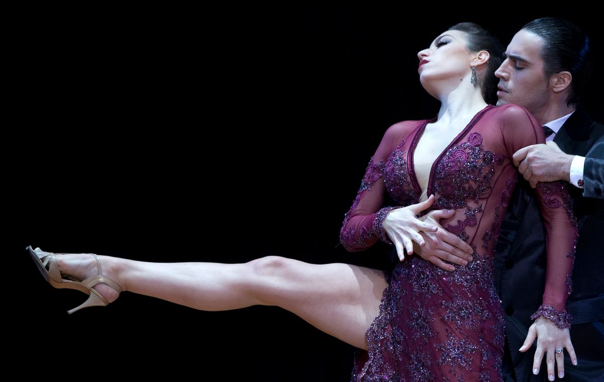 In this Aug. 26, 2014 photo, Juan Malizia Gatti and Manuela Rossi, from Argentina, compete during the 2014 Tango World Championship Stage category final, in Buenos Aires, Argentina. Gatti and Rossi won the championship. (AP Photo/Natacha Pisarenko) (AP)