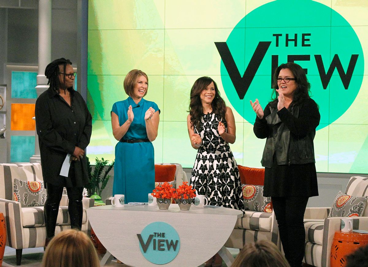 In this image released by ABC,  co-hosts, from left, Whoopi Goldberg, Nicolle Wallace, Rosie Perez and Rosie O'Donnell appear on the set of the daytime talk show "The View," on Monday, Sept. 15, 2014 in New York. (AP Photo/ABC, Lou Rocco)   (AP)