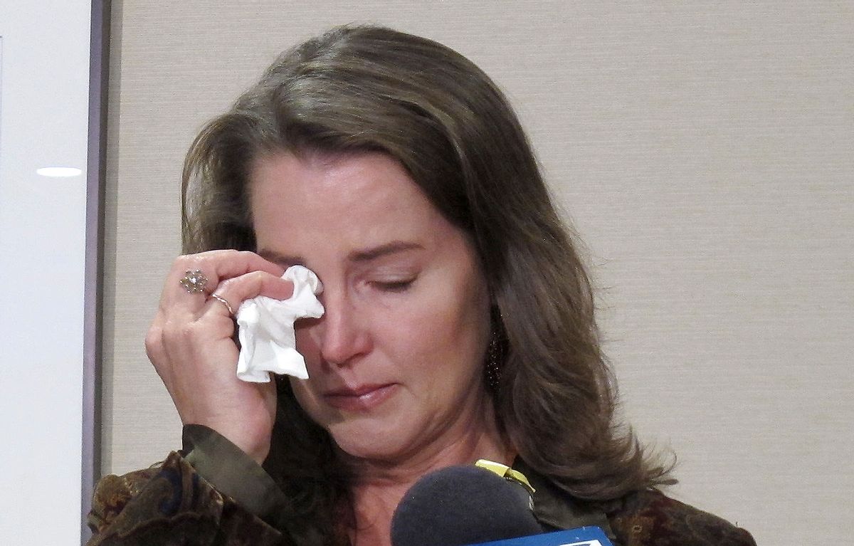 Cylvia Hayes, fiancee of Oregon Gov. John Kitzhaber, cries as she speaks at a news conference in Portland, Ore. on Thursday, Oct. 9, 2014. Hayes has admitted that she violated the law when she married an immigrant seeking to retain residency in the United States. She said she was "associating with the wrong people" while struggling to put herself through college and regrets her actions. (AP Photo/Gosia Wozniacka) (AP)