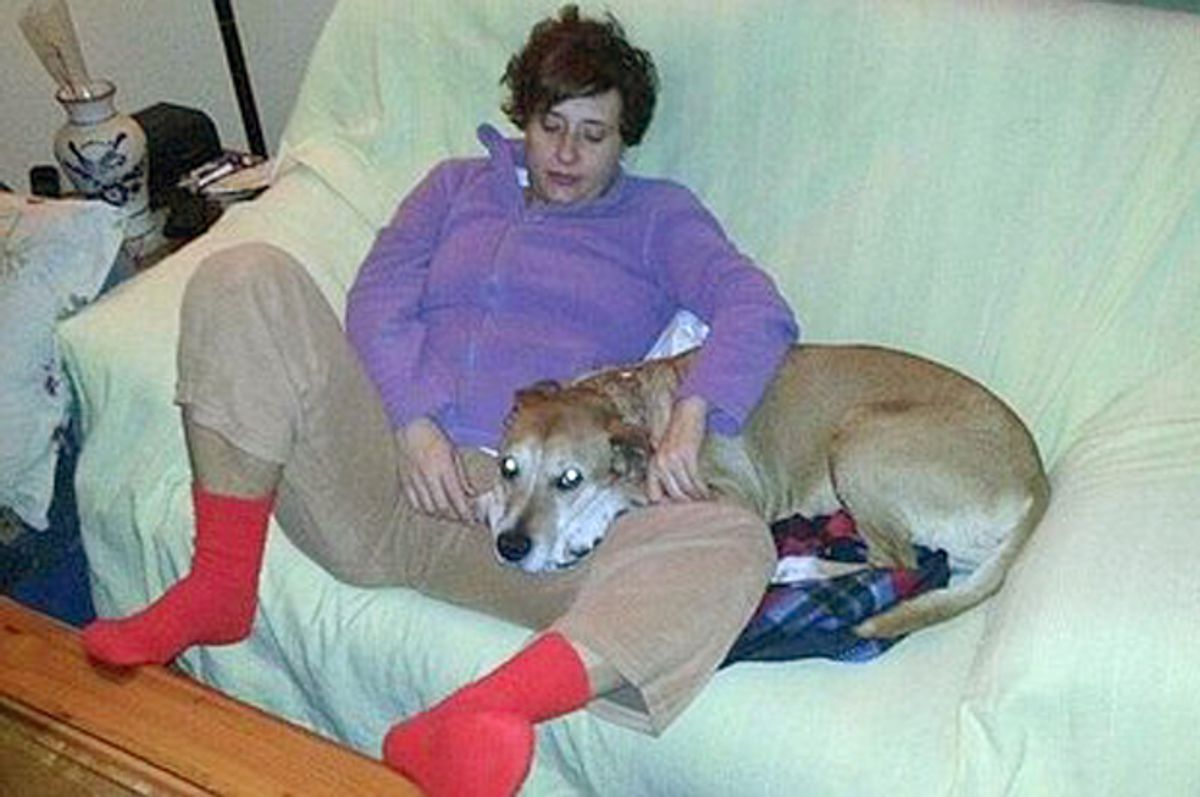 Teresa Romero, the nursing assistant who is infected with Ebola in Madrid, with her dog named Excalibur.         (AP)