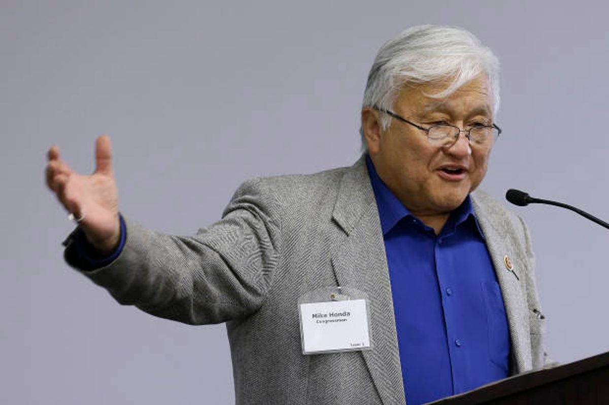 FILE- In this May 2, 2013 file photo, U.S. Rep. Mike Honda speaks during the City of Fremont Legislative Brunch at Tesla motors in Fremont, Calif. Honda and Tom McClintock have never apologized for their strong partisan leanings and are not about to start now. Honda, one of Congress' most liberal lawmakers, and McClintock, one of its most conservative, face challengers from within their own party in next Tuesday's midterm elections. (AP Photo/Jeff Chiu, file) (AP)