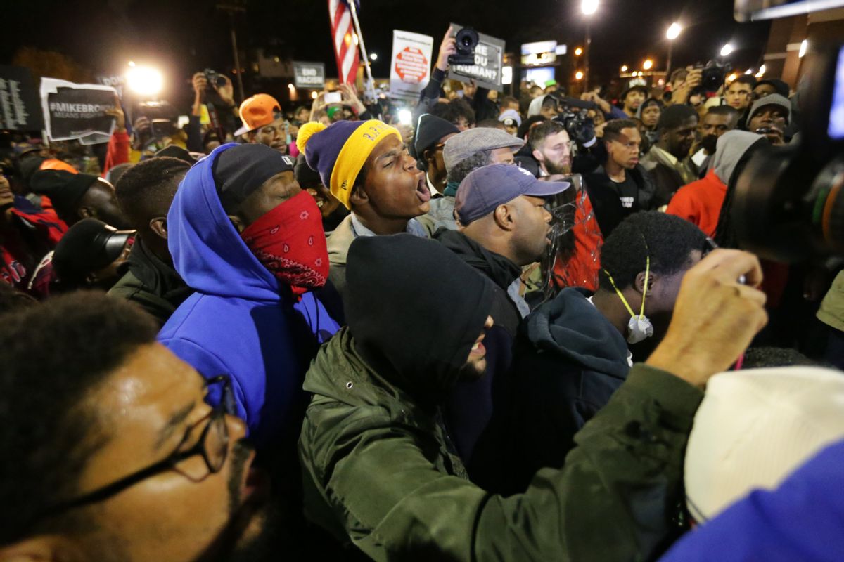 Demonstrators rally in Ferguson on Friday, Oct. 10, 2014, as part of a weekend of planned protests called Ferguson October.     (AP/St. Louis Post-Dispatch, Robert Cohen)