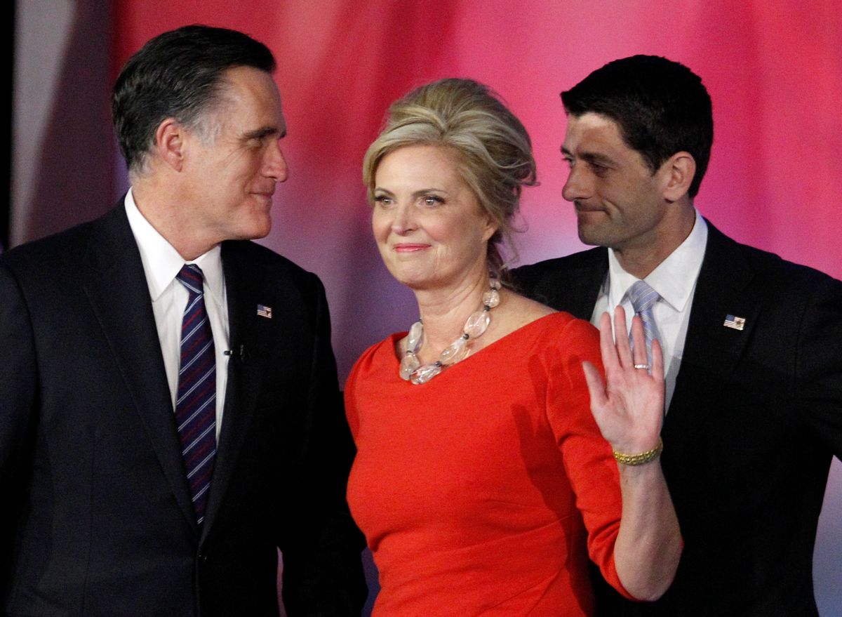 FILE - In this Nov. 7, 2012, file photo, Republican presidential candidate and former Massachusetts Gov. Mitt Romney, left, speaks to his running mate, vice presidential candidate, Rep. Paul Ryan, right, R-Wis., as Romney's wife Ann waves to supporters after Romney conceded the race during his election night rally in Boston. Romney and his wife Ann announce an initiative to accelerate treatment and cures for complex neurological diseases, in partnership with Bostons Brigham and Womens Hospital. (AP Photo/Stephan Savoia, File) (AP)