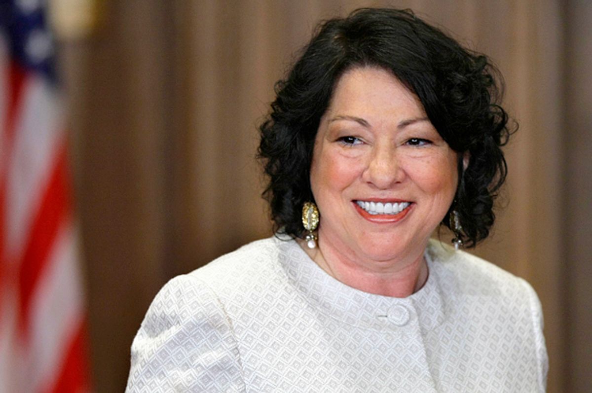 Sonia Sotomayor arrives to be sworn in as the Supreme Court's first Hispanic justice and only the third woman in the Court's 220-year history.      (AP/J. Scott Applewhite)