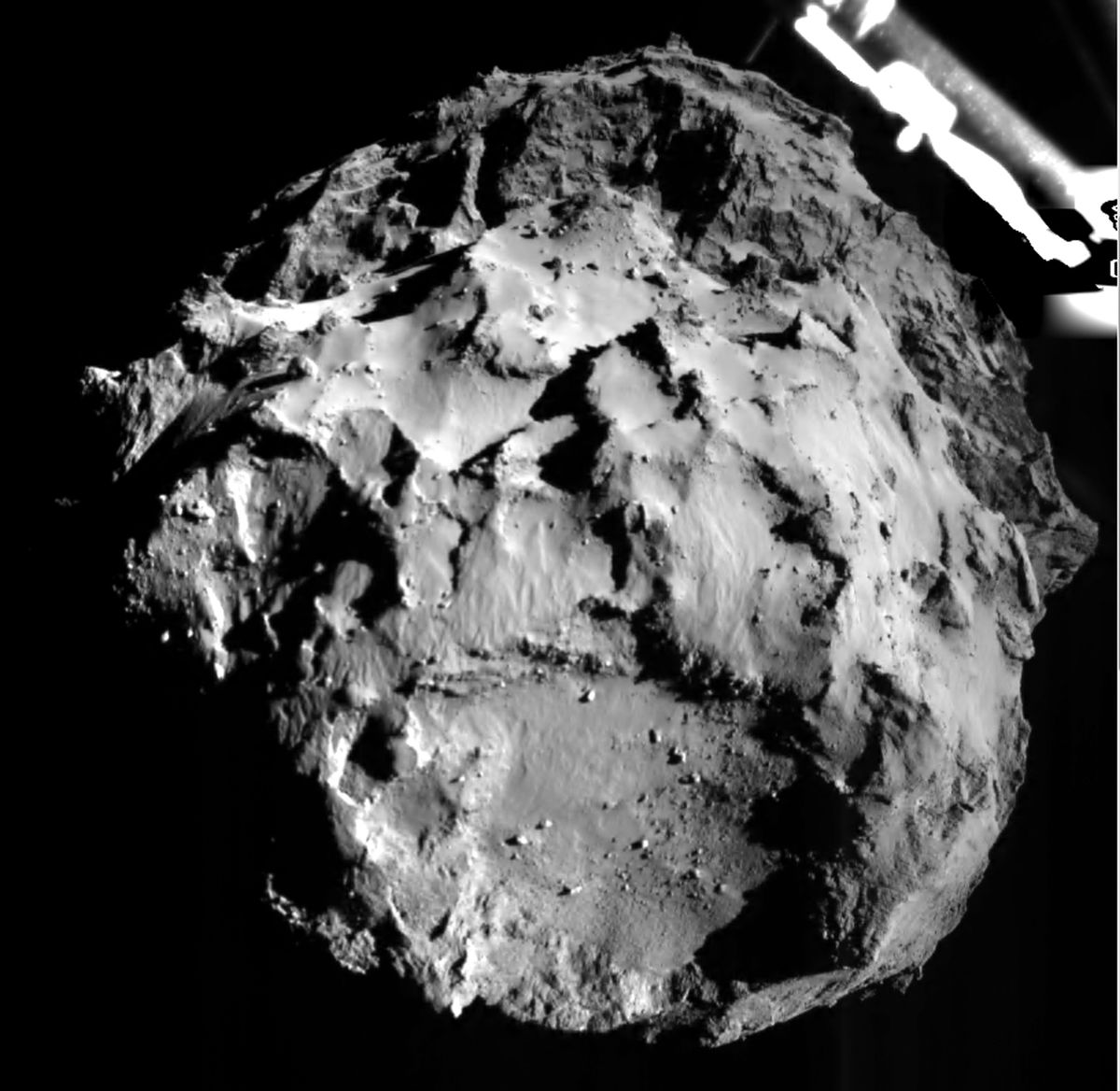 The picture released by the European Space Agency ESA on Wednesday, Nov. 12, 2014 was taken by the ROLIS instrument on Rosetta's Philae lander during descent from a distance of approximately 3 km from  the 4-kilometer-wide (2.5-mile-wide) 67P/Churyumov-Gerasimenko comet.  Hundreds of millions of miles from Earth, the European spacecraft made history Wednesday by successfully landing on the icy, dusty surface of a speeding comet.  (AP Photo/ESA)   (AP/ESA)