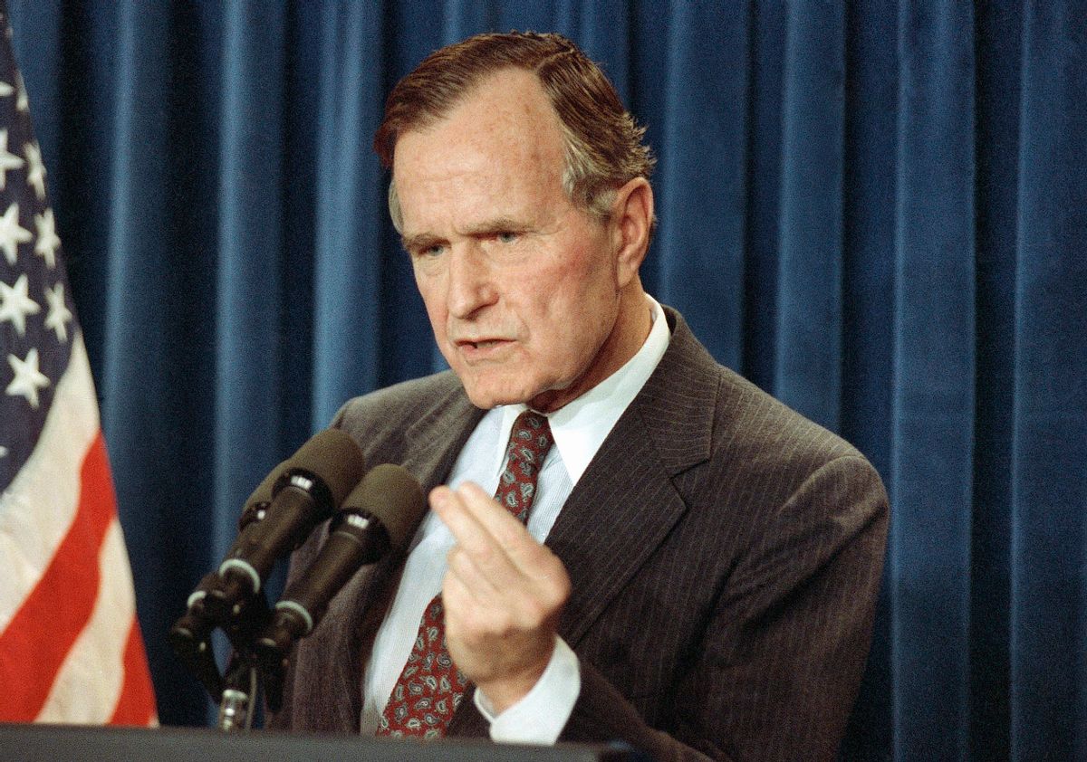 FILE - In this Jan. 12, 1991 file photo, President George H.W. Bush speaks during a news conference at the White House in Washington. President Barack Obama's impending unilateral order awarding legal status to millions of immigrants is not unprecedented. Two of the last three Republican presidents _ Ronald Reagan and George H.W. Bush _ did the same thing in extending amnesty to family members not covered by the last major overhaul of  immigration law in 1986. There was no political explosion then comparable to the one Republicans are threatening now.  (AP Photo/Charles Tasnadi, File) (AP)