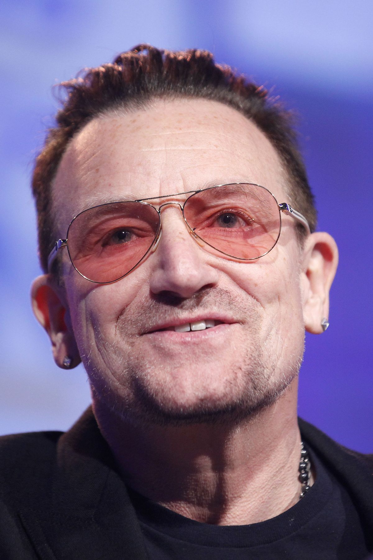 This March 7, 2014, file photo shows Bono speaking to delegates during the European People's Party Elections Congress at the convention center, Dublin, Ireland. (AP Photo/Peter Morrison)