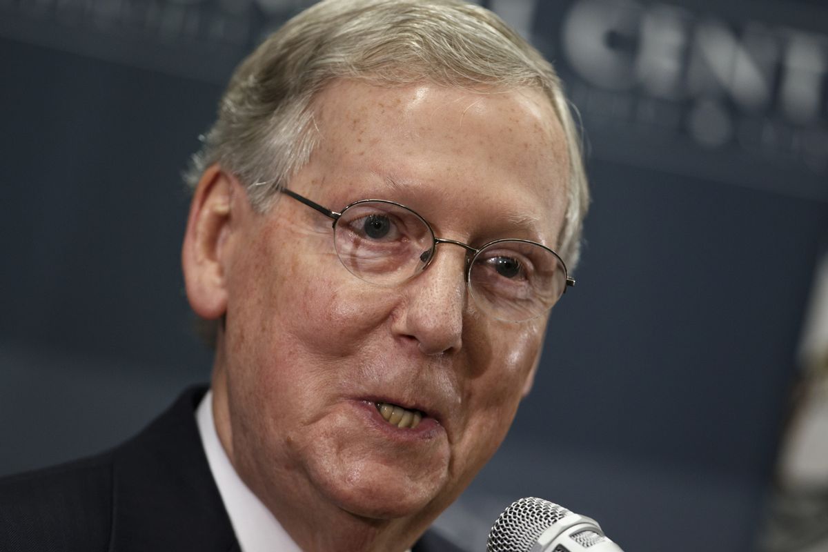 Senate Republican leader Mitch McConnell of Kentucky holds a news conference on the day after he was re-elected to a sixth term and the GOP gained enough seats to control the Senate in next year's Congress and make McConnell majority leader, in Louisville, Ky., Wednesday, Nov. 5, 2014. (AP Photo/J. Scott Applewhite)  