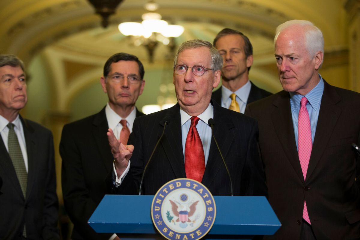 Senate Minority Leader Mitch McConnell of Ky., center, gestures during a news conference on Capitol Hill in Washington, Tuesday, Dec. 2, 2014. From left are, Sen. Roy Blunt, R-Mo., Sen. John Barrasso, R-Wyo., McConnell, Sen. John Thune, R-S.D., and Senate Minority Whip John Cornyn of Texas. (AP Photo/Evan Vucci)  (AP)