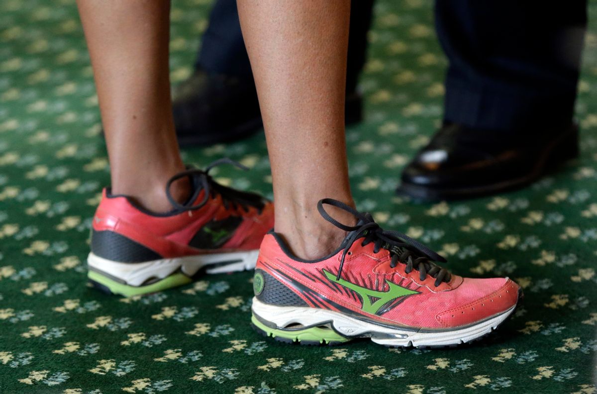Sen. Wendy Davis, D-Fort Worth, wears running shoes as she filibusters in an effort to kill an abortion bill, Tuesday, June 25, 2013, in Austin, Texas. The bill would ban abortion after 20 weeks of pregnancy and force many clinics that perform the procedure to upgrade their facilities and be classified as ambulatory surgical centers.  (AP Photo/Eric Gay)         (AP/Eric Gay)