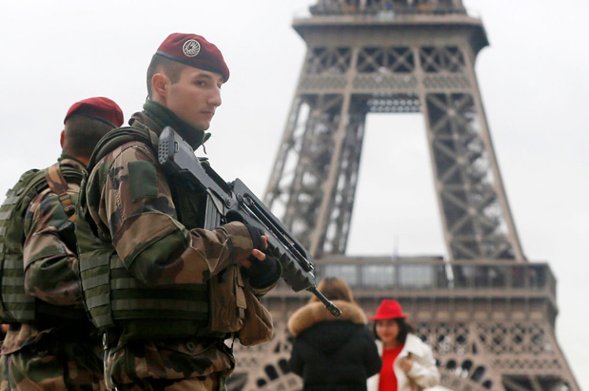 French soldiers patrol near the Eiffel Tower in Paris, January 9, 2015.                  (Reuters/Gonzalo Fuentes)