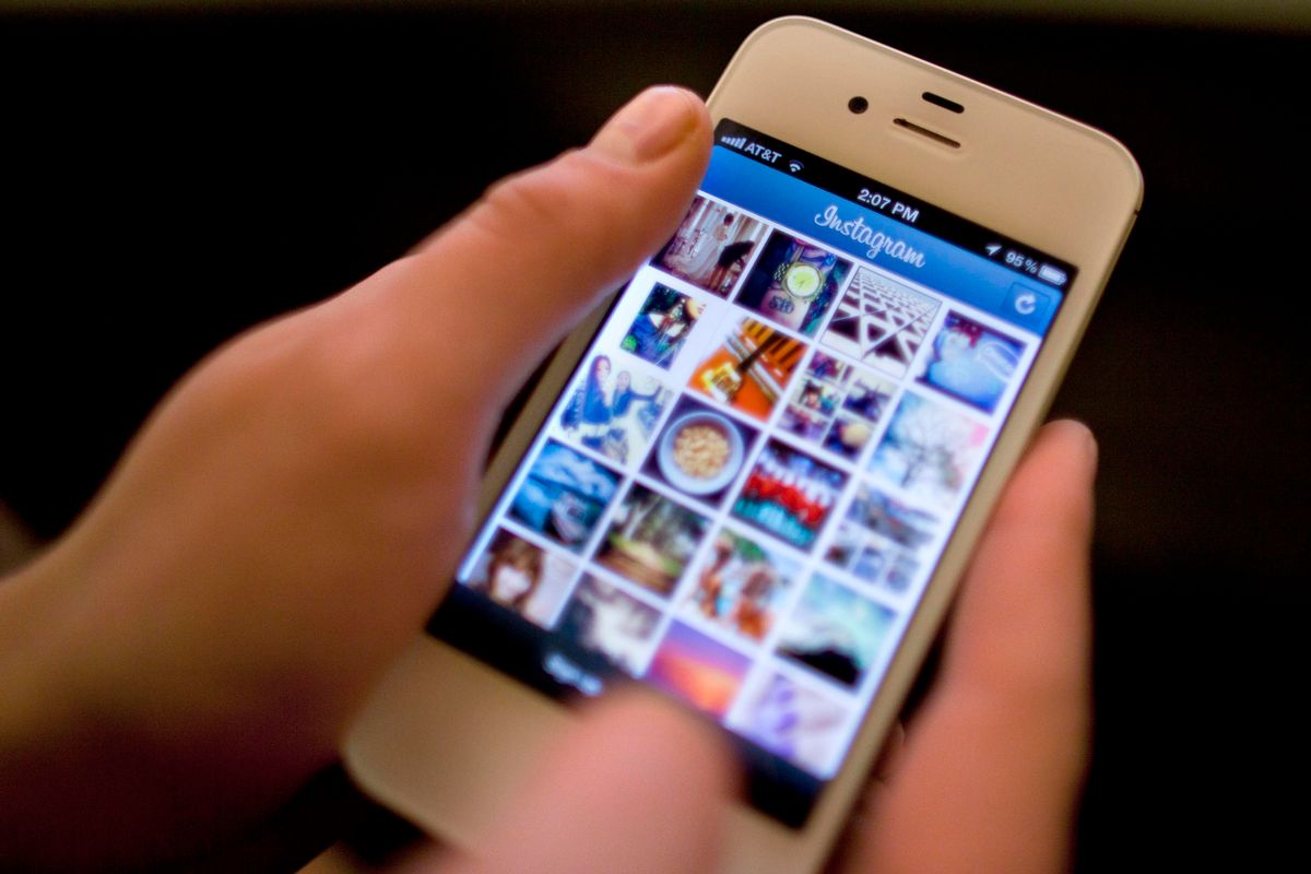 File-This April 9, 2012, file photo shows Instagram being demonstrated on an iPhone in New York. (AP Photo/Karly Domb Sadof, File)     (AP)