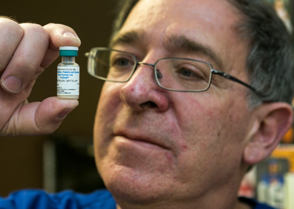 Pediatrician Charles Goodman holds a dose of the measles-mumps-rubella vaccine, or MMR vaccine at his practice in Northridge, Calif., Thursday, Jan. 29, 2015.   Some doctors are adamant about not accepting patients who don't believe in vaccinations, with some saying they don't want to be responsible for someone's death from an illness that was preventable. Others warn that refusing treatment to such people will just send them into the arms of quacks. (AP Photo/Damian Dovarganes) (AP)