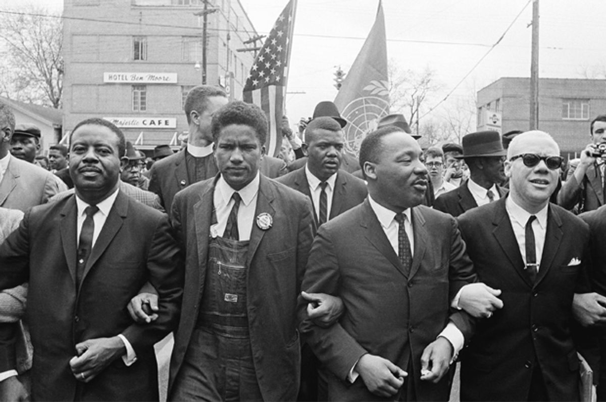 Dr. Martin Luther King, Jr. leads a march of several thousands to the court house in Montgomery, Ala., March 17, 1965.        (AP)