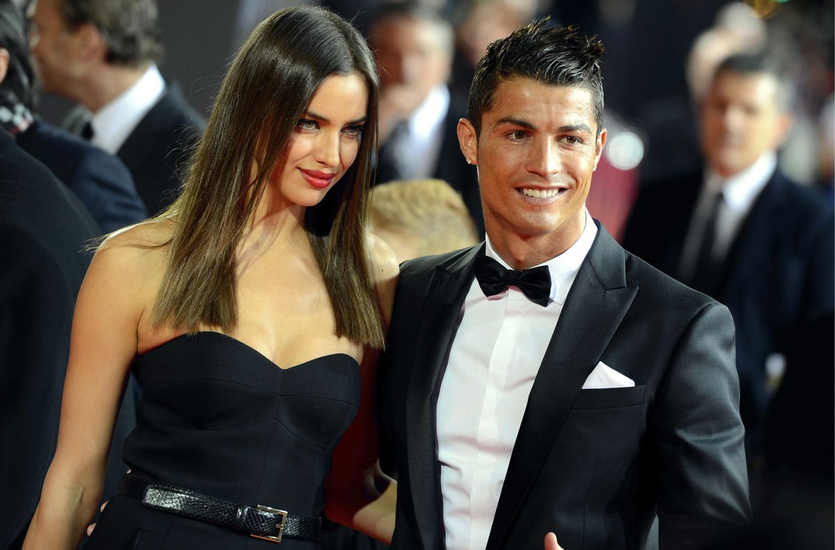 FILE - This is a Monday, Jan. 7, 2013 file photo of Portugal's Cristiano Ronaldo, right, as he  arrives with his girlfriend Irina Shayk,  on the red carpet prior to the FIFA Ballon d'Or Gala 2013 held at the Kongresshaus in Zurich, Switzerland.  Cristiano Ronaldo confirmed Tuesday Jan. 20, 2015 that he has broken up with his longtime girlfriend, Russian model Irina Shayk. (AP Photo/Keystone/Walter Bieri) (AP)