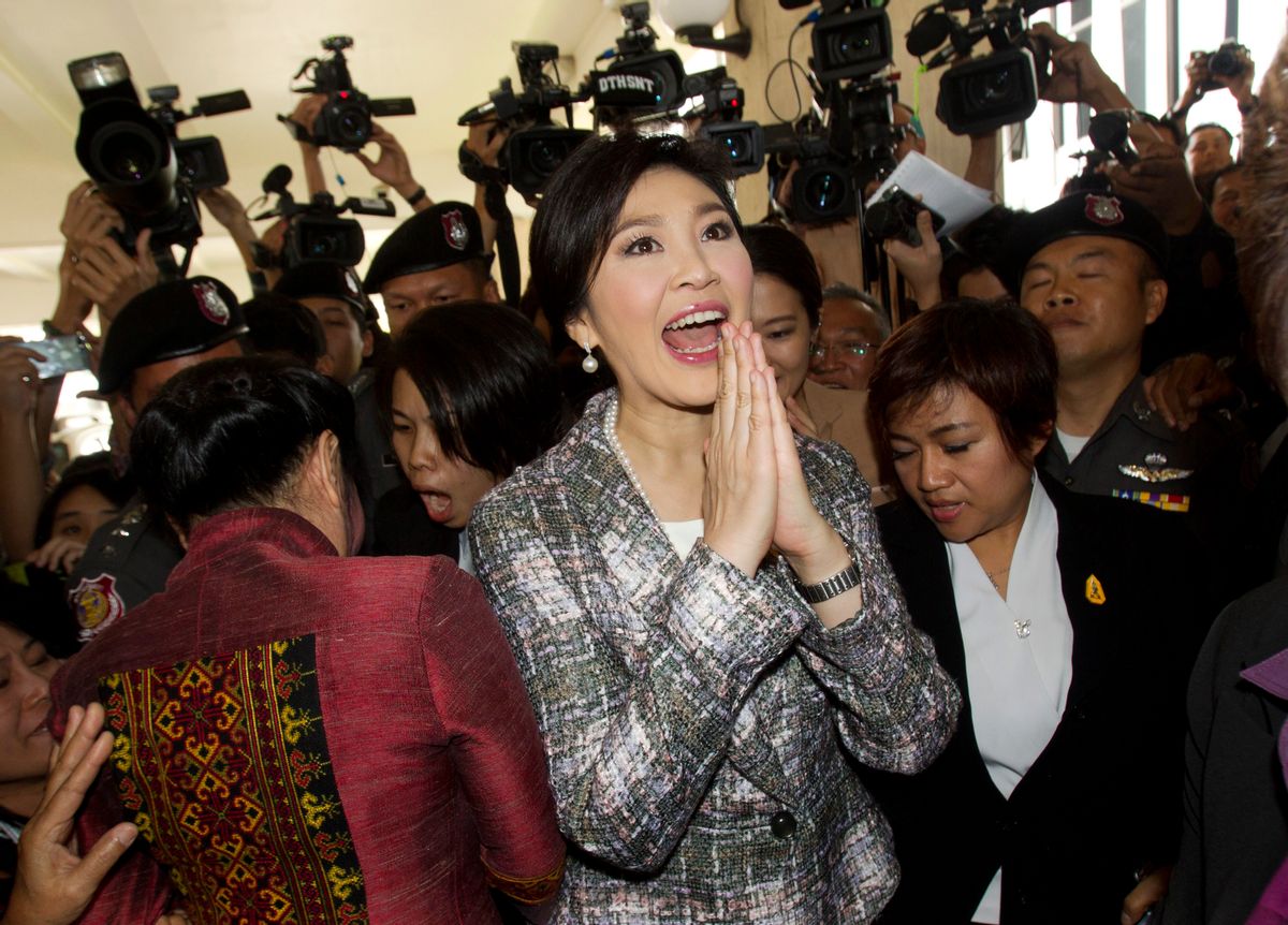 Thailand's former Prime Minister Yingluck Shinawatra leaves parliament in Bangkok, Thailand, Thursday, Jan. 22, 2015.Thailand's military-appointed legislature is set to vote on impeachment against Yingluck over a government's rice subsidy scheme on Friday. AP Photo/Sakchai Lalit) (Sakchai Lalit)