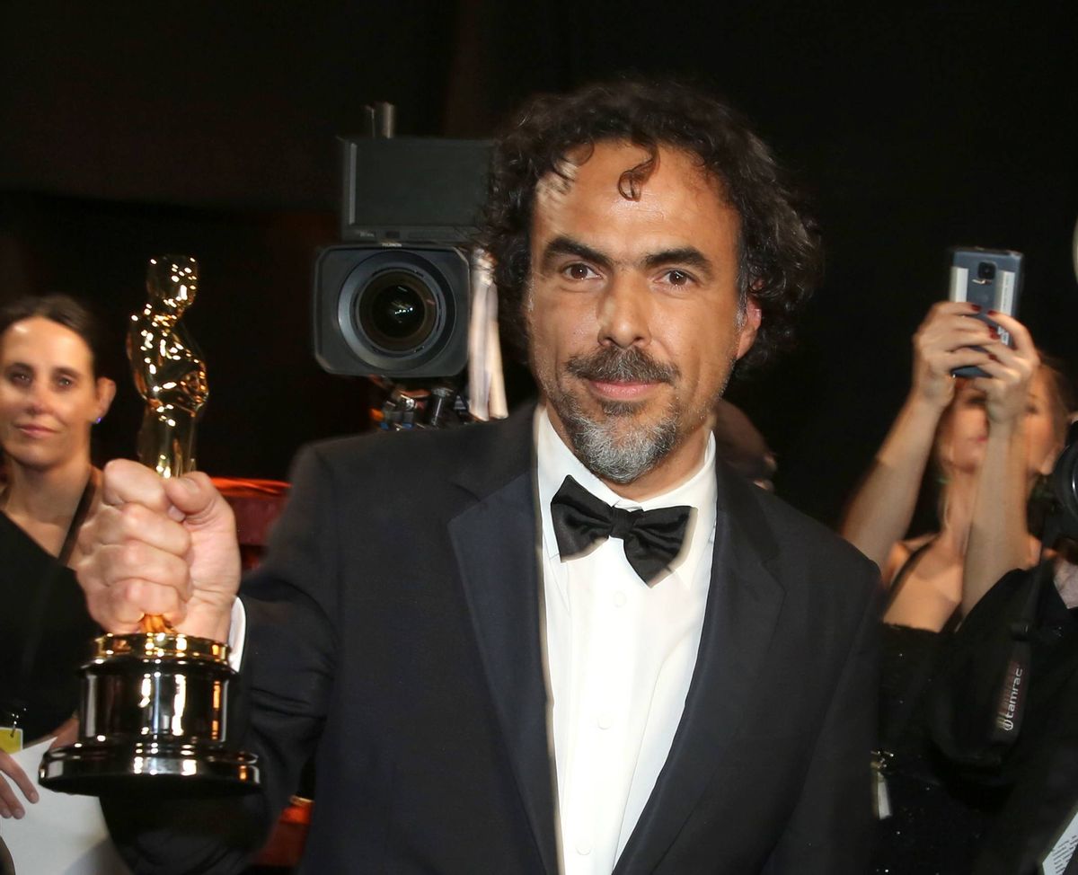 Alejandro Gonzalez Inarritu appears backstage with his award for best director for "Birdman" at the Oscars on Sunday, Feb. 22, 2015, at the Dolby Theatre in Los Angeles. (Photo by Matt Sayles/Invision/AP)  (Matt Sayles/invision/ap)