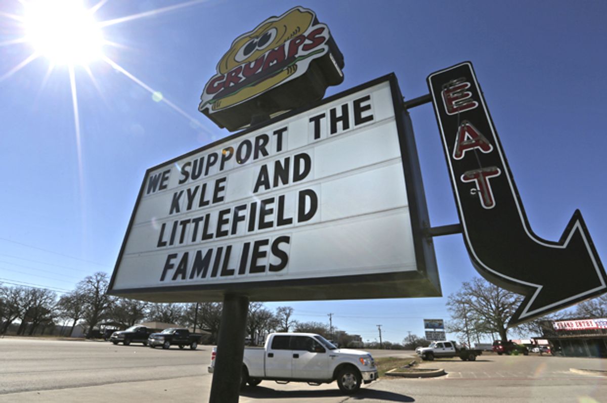 A sign displaying support for the families of Chris Kyle and Chad Littlefield, Feb. 10, 2015, in Stephenville, Texas.      (AP/Lm Otero)